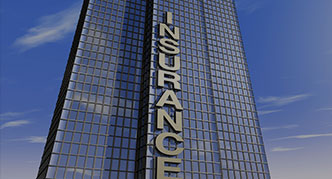 A tall building prominently displaying the word "insurance" on its facade